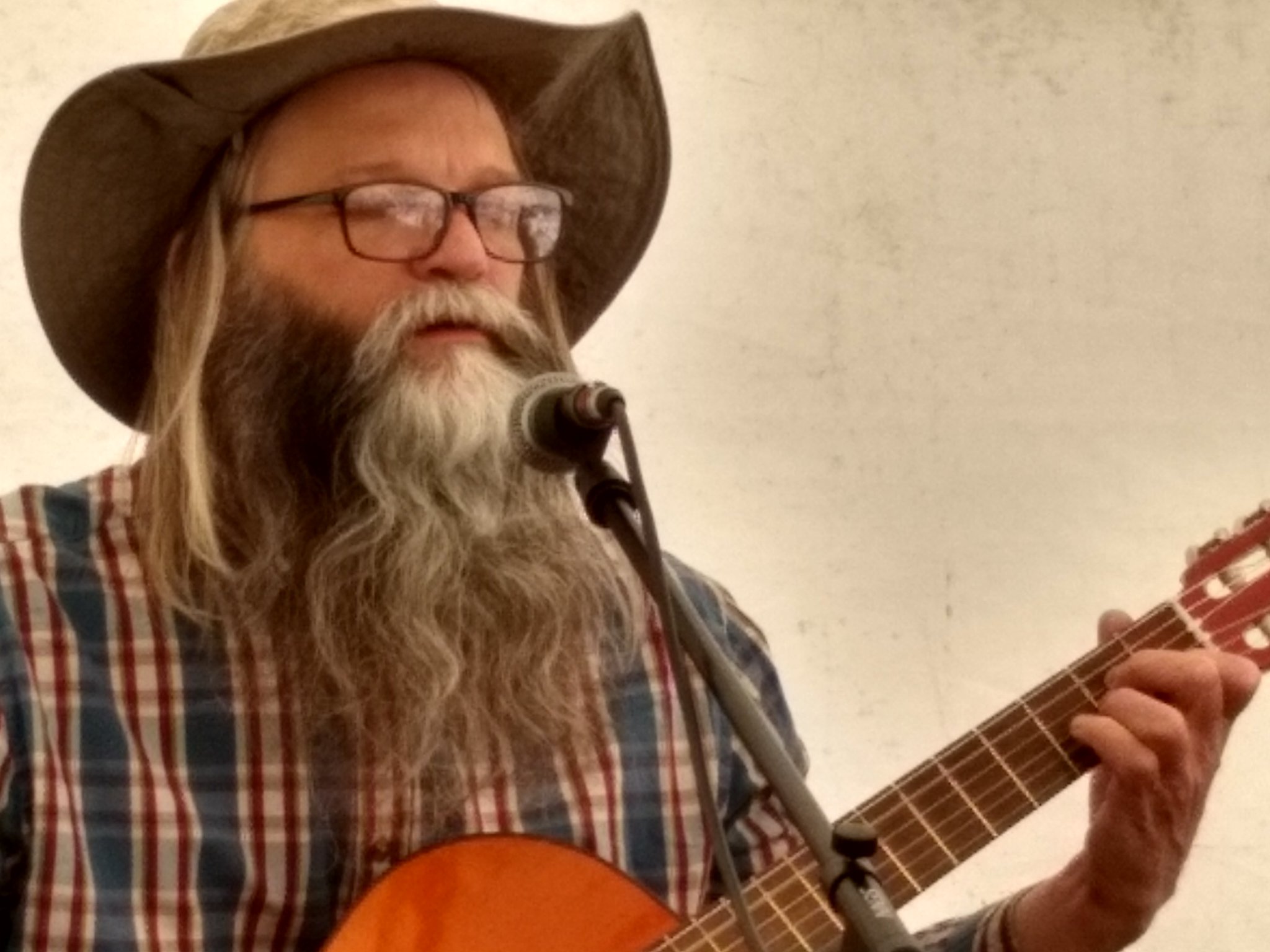 Alan.s.Robinson playing guitar and singing with Paul Pearson on Bodhran